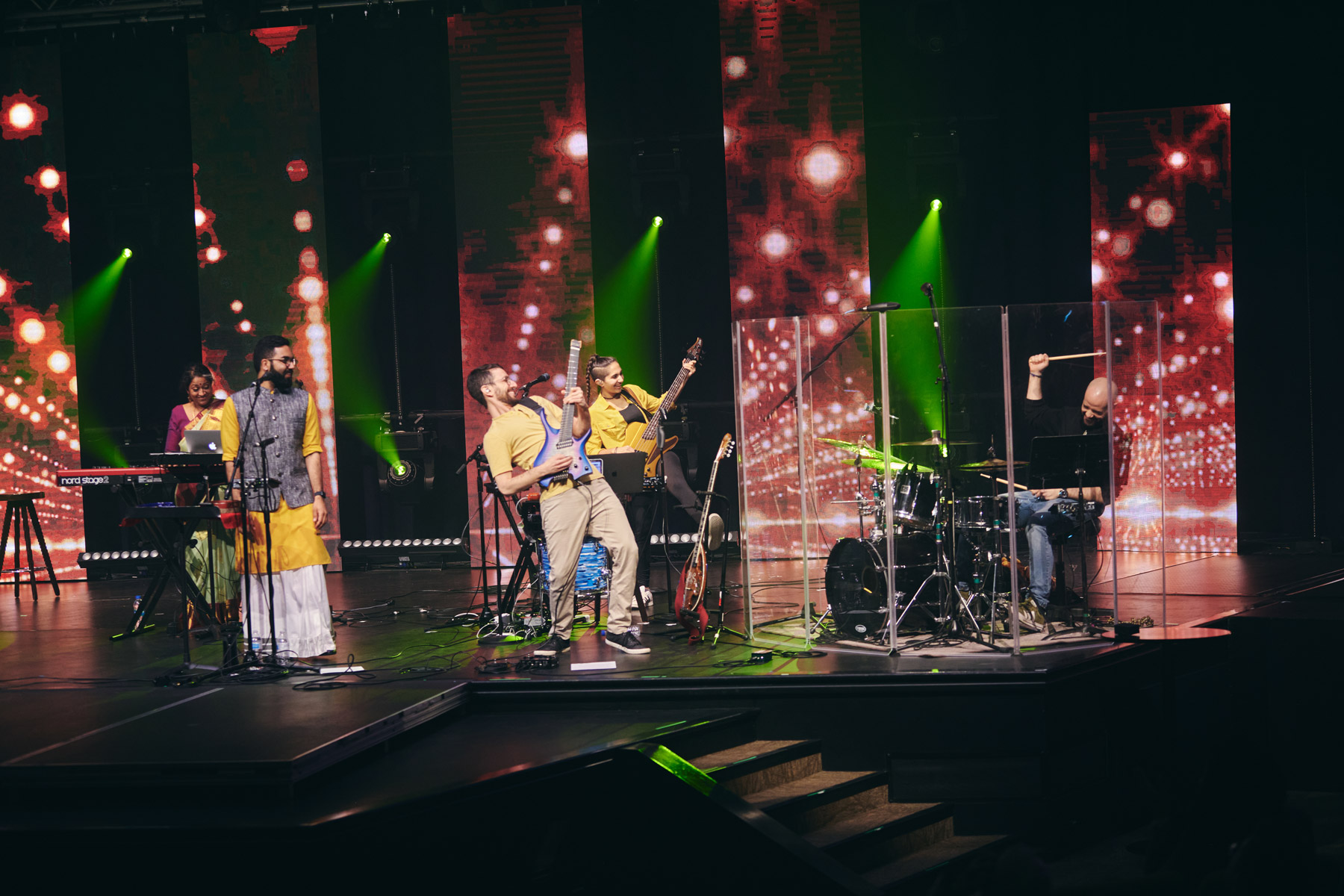 Sharon posing under arch for Collaborations Link